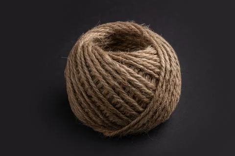 Coil of rope on dark background Foto stock