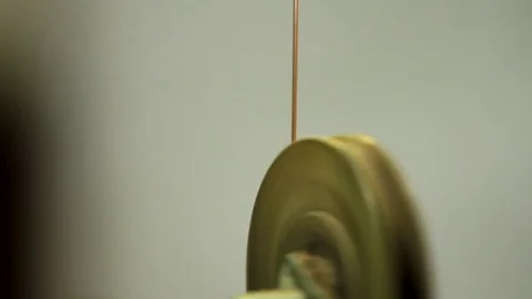 Coil spinning unwinding a copper cable Stock-Footage 76951001