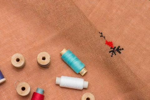 Coil thread on the canvas. Multicolored thread. Wooden coils. 写真素材