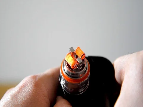 Coil of vape e-cigarette Stock Footage