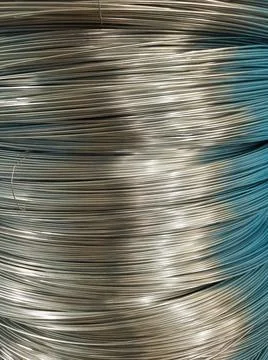 Coil of wire. Wire reel. knitting wire. Steel wire. Wire production. Wire manufa Stock Photos