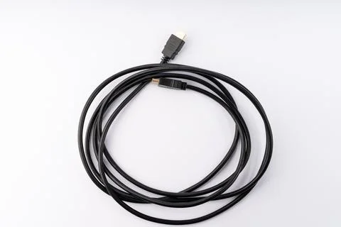 Coiled Black HDMI Cable for High-Definition Connectivity Stock Photos