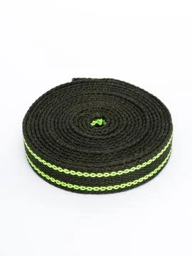 Coiled black webbing strap with green stripe Stock Photos