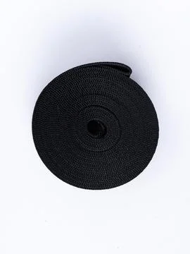 Coiled black webbing strap Stock Photos