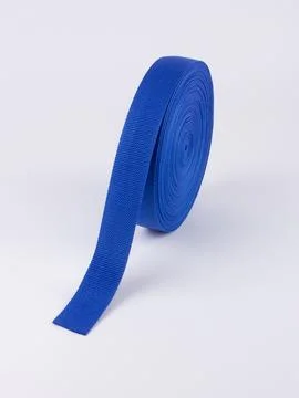 Coiled blue webbing strap studio shot variant Fotos Stock