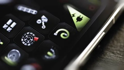 Coiled cable icon highlighted on component grid Stock Photos