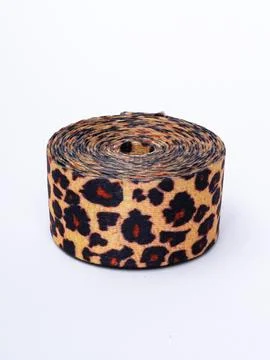 Coiled leopard print trim ribbon Stock Photos