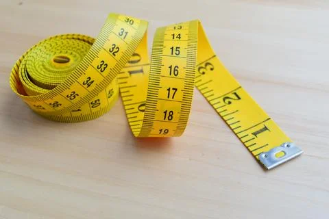 Coiled measuring tape Stock Photos