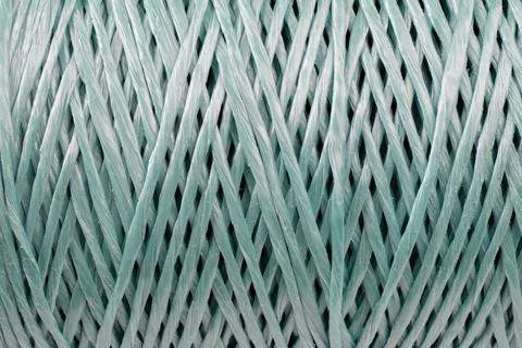 Coiled nylon rope texture background. Blue rolled  striped nylon rope pattern Stock Photos