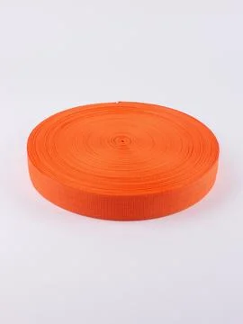 Coiled orange webbing strap studio shot variant two Stock Photos