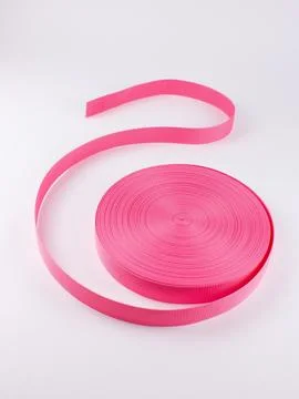 Coiled pink webbing strap studio shot variant two Stock Photos