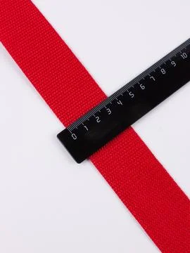 Coiled pink webbing strap studio shot Stock Photos