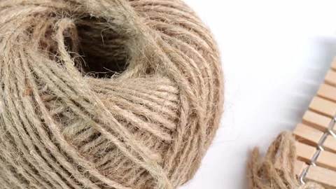 Coiled raw rope Made of various fibers into a long rope. Empty with a small c Stock Footage 195793942