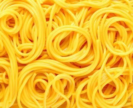 Coiled spaghetti pasta Stock Photos
