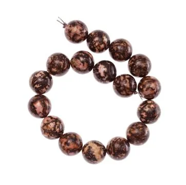 Coiled string of beads from rhodonite gemstone Stock Photos