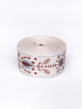 Coiled white floral pattern trim ribbon Stock Photos