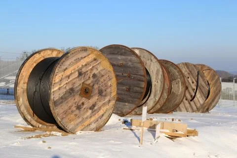 Coils with cable in the snow Stock Photos