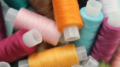 Coils with colored threads Stock Photos