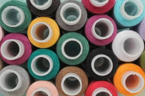 Coils with colored threads Stock Photos