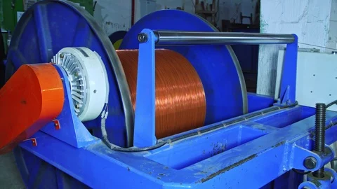 Coils of copper wire industry in the middle of empty coils, slider shot 4K Stock Footage 100083216