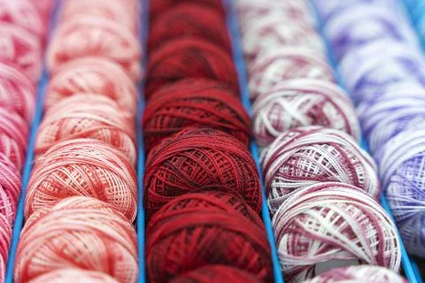 Coils of multicolored woolen threads. background. knitting, needlework Stock-Fotos