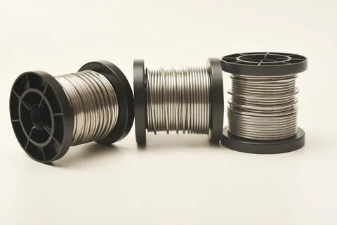Coils with solder. Plastic coils with tin-lead solder. Materials for electr.. Stock Photos