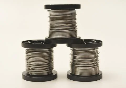 Coils with solder. Plastic coils with tin-lead solder. Materials for electr.. Stock Photos