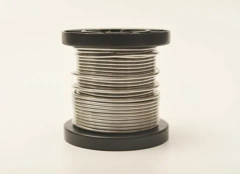 Coils with solder. Plastic coils with tin-lead solder. Materials for electr.. Stock Photos