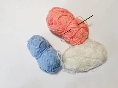 Coils of thread with the hook inserted, so as not to get lost Stock Photos