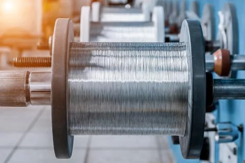 Coils with tinned wire. Stock Photos
