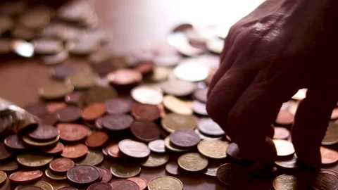 Coin base on a table Stock Footage 147458025