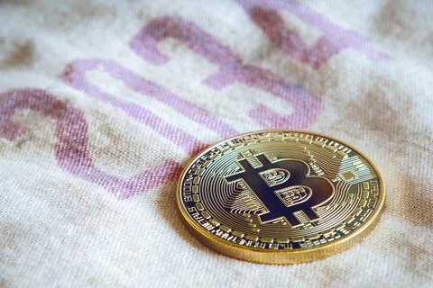 Coin bitcoin in the background, cryptocurrency electronic Stock Photos