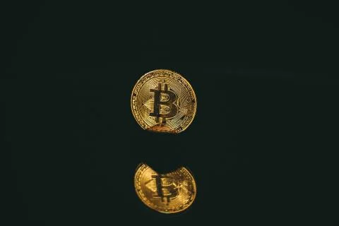 Coin bitcoin with reflection in the mirror Foto stock