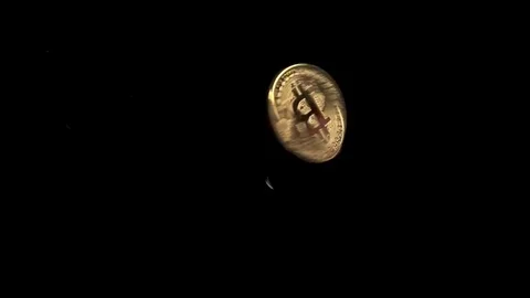 Coin Bitcoin rotates on a black background Stock-Footage 72374412