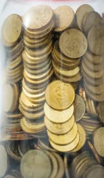 Coin on box Stock Photos