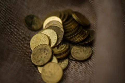 Coin on box Stock Photos