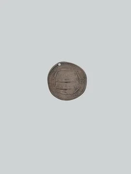 Coin dated A.H. 166/ A.D. 783 Minted during the era of the Abbasid caliphat.. Stock Photos
