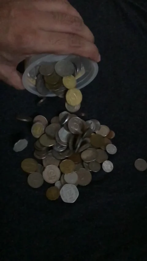 Coin Dropping from box Stock Footage 132597355