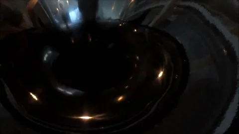 Coin going down hole Stock Footage 181209306