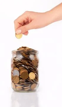 Coin jar Stock Photos