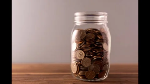 Coin Jar Timelapse Stock Footage 332302541