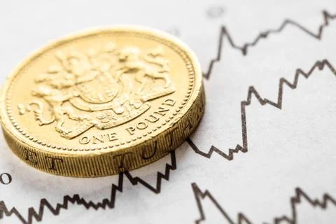 The coin one pound on graphics background Stock Photos