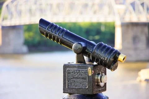 Coin-operated binoculars in view of Cincinnati on the Ohio River, with bridge in Stock Photos