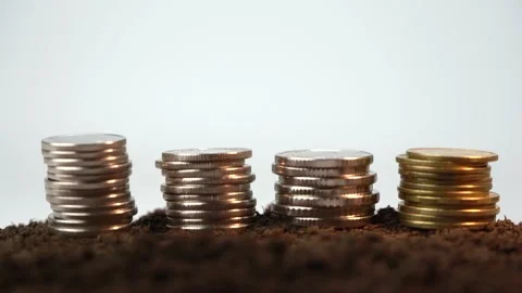Coin Pillars Lying on Ground on White Background Stock Footage 182840392