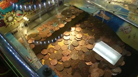 Coin push machine in amusement arcade Stock Footage
