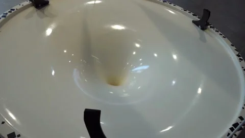 The coin rolls into the funnel Video stock 89939269