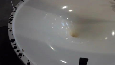 The coin rolls into the funnel Stock-Footage 89941625