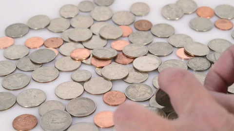 Coin rotating on top of coins Stock Footage 36157260
