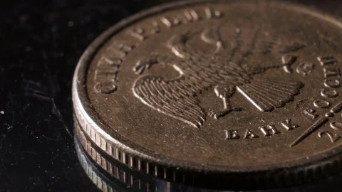 The coin of the Russian ruble rotates in macro Stock Footage 102559924