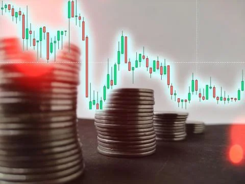 Coin stack step down graph with decreasing candlesticks graph, Risk management Stock Photos